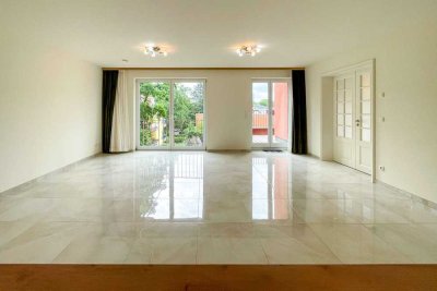 Familienfreundliche 5-Zimmerwohnung mit 2 Balkone, Garage und großen Garten