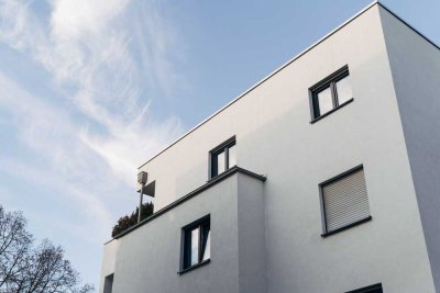 Komfortables 3,5-Zimmer-Penthouse mit riesiger Dachterrasse, toller Einbauküche und Tiefgarage