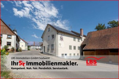 Wohn- und Geschäftshaus mit Photovoltaik-Anlage
