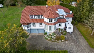 Wohnobjekt mit Gewerbeeinheit und großem Grundstück