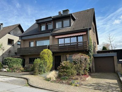 TOP-Lage Homberg: Solide Doppelhaushälfte mit reichlich Platz, Garten und Garage in bester Lage