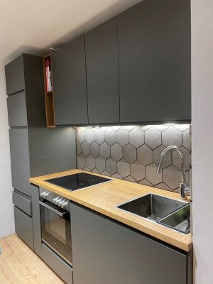 Charmante 3-Zimmer-Wohnung mit Balkon, Tiefgarage und Blick ins Grüne – zentral und dennoch ruhig