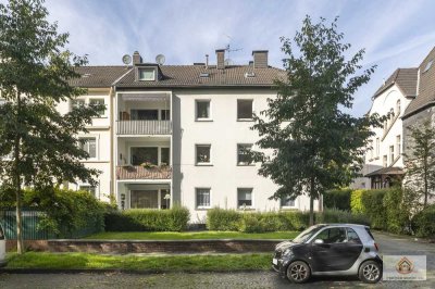 Zentrumsnahe 3-Zimmer-Wohnung mit Loggia, Garage und Gartenanteil