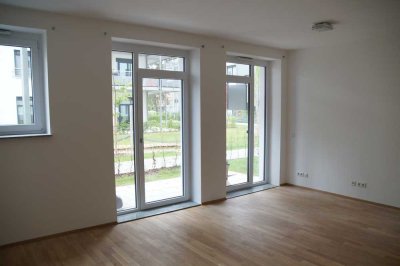Moderne 2,5-Zimmer-Wohnung mit Gartenterrasse, EBK und Tiefgarage (E-Auto!)