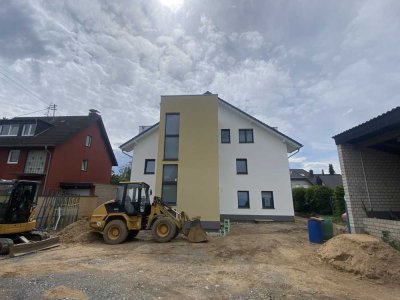 Neubau in Rheinnähe: Moderne top ausgestattete Wohnung in Mondorf