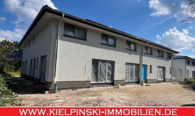 Neubau in Niendorf: 3-Zimmer-Maisonette-ETW im Effizienzhaus 55 mit Terrasse und eigenem Garten