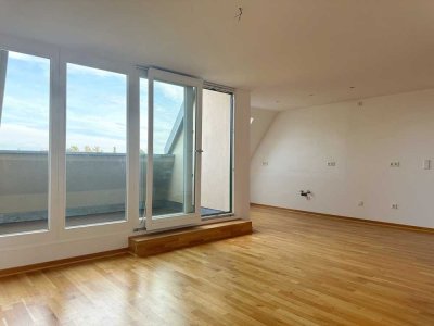 Urbanes Wohnjuwel im Denkmal: Kernsanierte DG-Wohnung mit Loggia