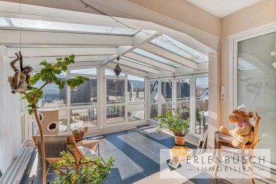 Außergewöhnliche 3,5-Zimmer-Wohnung mit Wintergarten & Dachterrasse