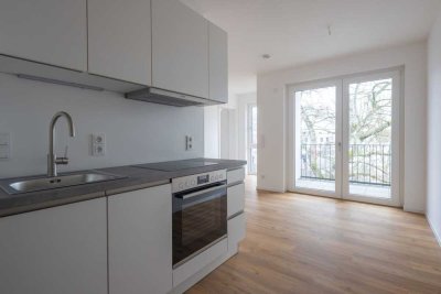 Traumhafte 1,5-Zimmer-Wohnung mit 2 Westbalkonen inkl. Einbauküche zum Erstbezug