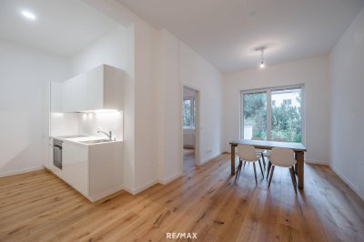 Sanierter Altbau mit modernem Neubau