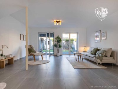 MANNELLA *Kinderlachen. Eigentum bilden. Lage genießen.* Reihenmittelhaus mitten in Hennef
