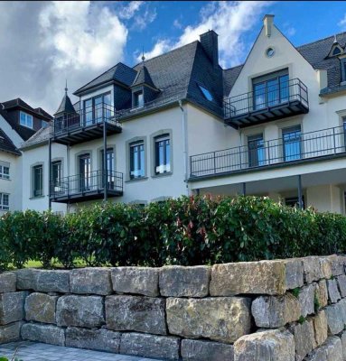 Obergeschosswohnung mit Gartennutzung in kernsanierter Altbauvilla