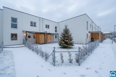 Familienglück im Grünen – nachhaltige Reihenhäuser am Kanal