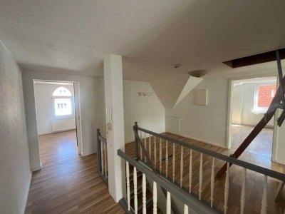 Dachgeschosswohnung mit Potenzial