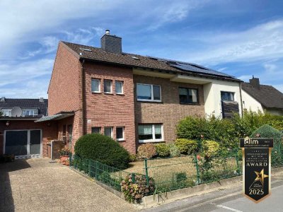 Modernisierungsbedürftige Doppelhaushälfte mit Garage und sonnigem Garten in Hilden-Nord