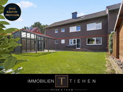 Gartenzeit inklusive - Erdgeschosswohnung mit Wintergarten, Garage und modernisiertem Tageslichtbad