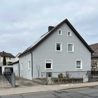 Doppelhaushäfte mit Garten und Garage