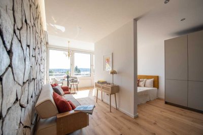 Erstbezug - Exklusive 1-Zimmer-Wohnung mit Seeblick