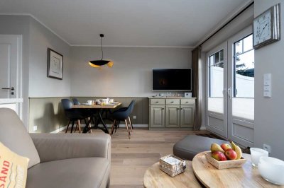 Luxuriöse 3 Raum Fewo Maisonette-Wohnung mit sonnigem Gartenanteil in Strand naher Lage!