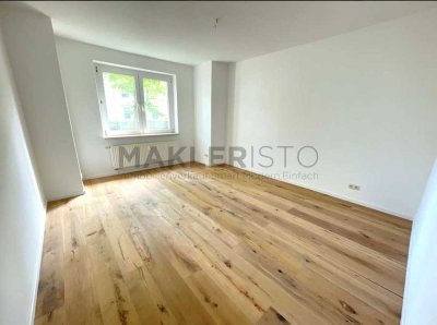 **Hochwertig modernisierte 2-Zimmer-EG-Wohnung mit Loggia, Balkon & Stellplatz**