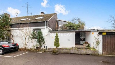 Großzügiges Einfamilienhaus mit Einliegerwohnung und gut vermieteter Gewerbeeinheit!