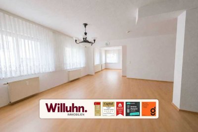 Komfortables Wohnen mit Hauscharakter | Großzügige EG-Wohnung mit Kamin, Gartenanteil & Garage