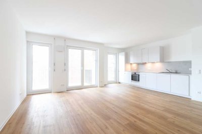 Sonnige Terrassenwohnung mit moderner Einbauküche, Balkon und Tiefgarage – großzügig & stilvoll wohn