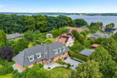 Ein Zuhause mit Ausstrahlung, Gartenparadies und viel Wohnqualität in Bestlage
