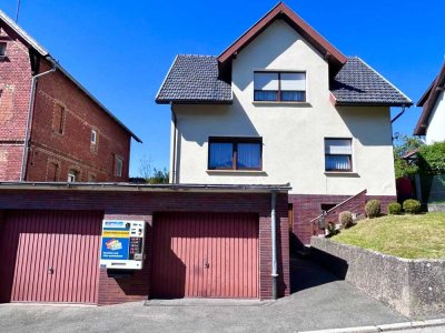 Einfamilienhaus mit Garten und Doppelgarage in Rödental – familienfreundlich & modernisierbar