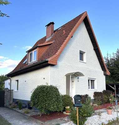 Einfamilienhaus mit großem Garten und Doppelcarport