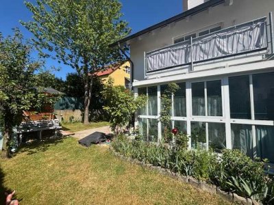 Herrliche 2 Zimmerwohnung mit verglaster Südterrasse, Garten und Hobbyraum