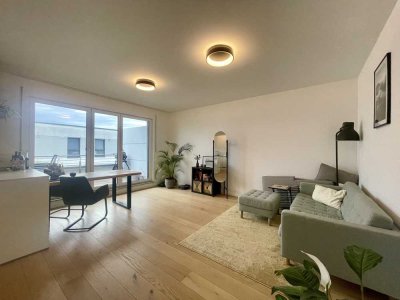 Neuwertige 3-Zimmer-Dachgeschosswohnung mit gehobener Innenausstattung inkl. 2 TG-Stellplätze