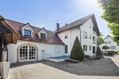 Flexibles MFH mit Gewerbe, Pool & Sauna auf 1.435 m² Grundstück in Gretesch