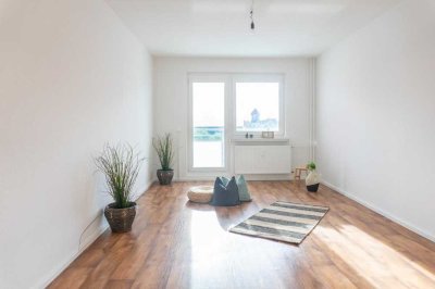 Modernisierte 4-Raum-Erdgeschosswohnung mit Balkon