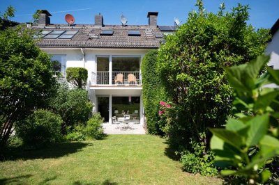 Familienglück in Top-Lage: Stilvolles Reihenhaus mit Garten & Skylineblick