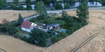 Sanierungsbedürftiges Einfamilienhaus - Alleinlage mit 3000m² Grundstück am See