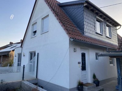 Zwei Häuser – ein Zuhause: Charmantes Ensemble mit moderner Technik und großem Garten in Worms