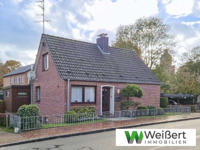 Familienfreundliches Einfamilienhaus mit großem Wintergarten 
und praktischer Garage in Krempe