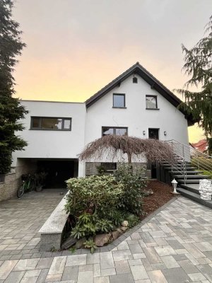 Einfamilienhaus -  Wohnen mit Wohlfühlfaktor im Grünen!