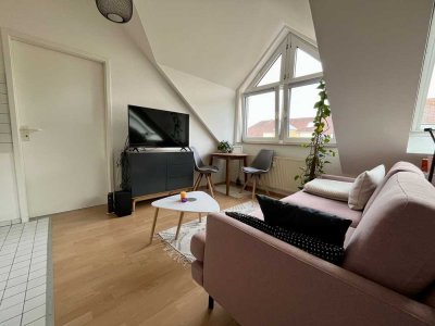 Kapitalanlage oder Selbstbezug: Helle 2-Zimmer-Wohnung mit EBK & 2 Stellplätzen in gefragter Lage