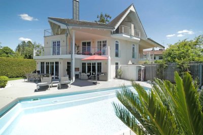 Zeitlose Eleganz – Exklusive Familienvilla mit Spa, Pool & sonnigem Garten. Toplage!