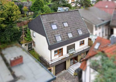 Charmantes Zweifamilienhaus mit großem Garten, zwei Wintergärten, Sauna und Ausbaupotenzial