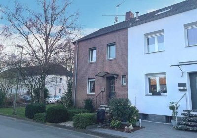 Sonnig und solide: Reihenendhaus mit 5 Zimmern, Terrasse und Garten - in Rheinnähe