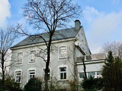 Charmante Erdgeschosswohnung mit Wintergarten und Gartennutzung