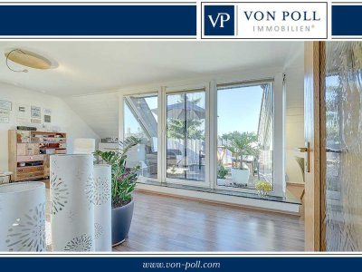 Moderne und großzügige Maisonettewohnung mit grünen Ausblick in zwei Familienhaus
