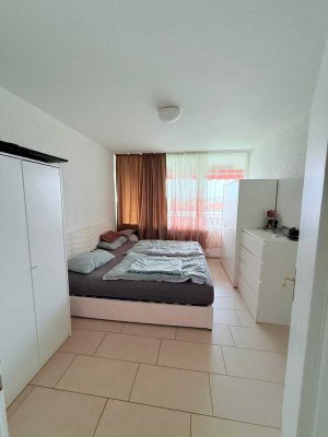 Geschmackvolle Wohnung mit drei Zimmern sowie Balkon und EBK in Weil Am Rhein