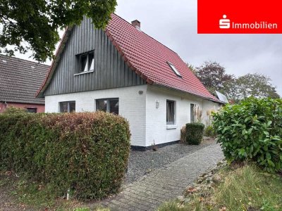 Charmantes Einfamilienhaus mit hellem Wintergarten und Dachterrasse