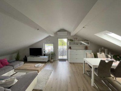 Modernisierte 2,5-Zimmer-DG-Wohnung mit Balkon und Klima