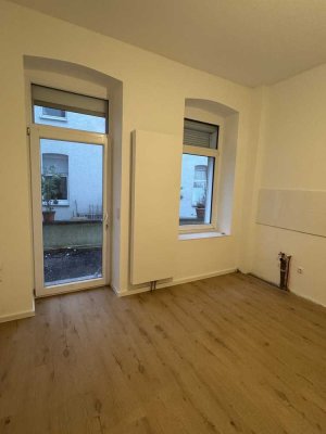 Lichtdurchflutete historische Erdgeschosswohnung zu vermieten