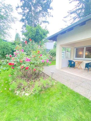 Living downtown in your own bungalow with a fenced in yard